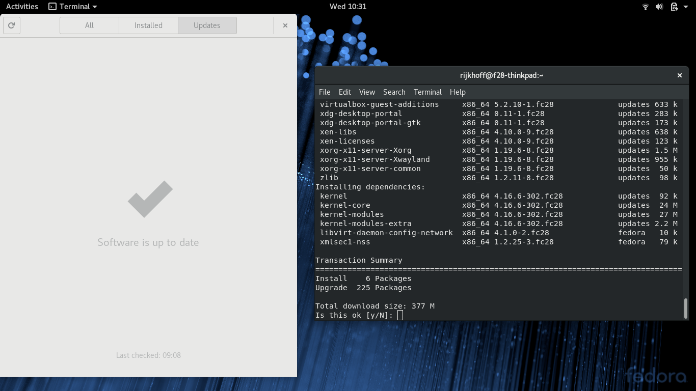 Fedora desktop screenshot: 28 updating software